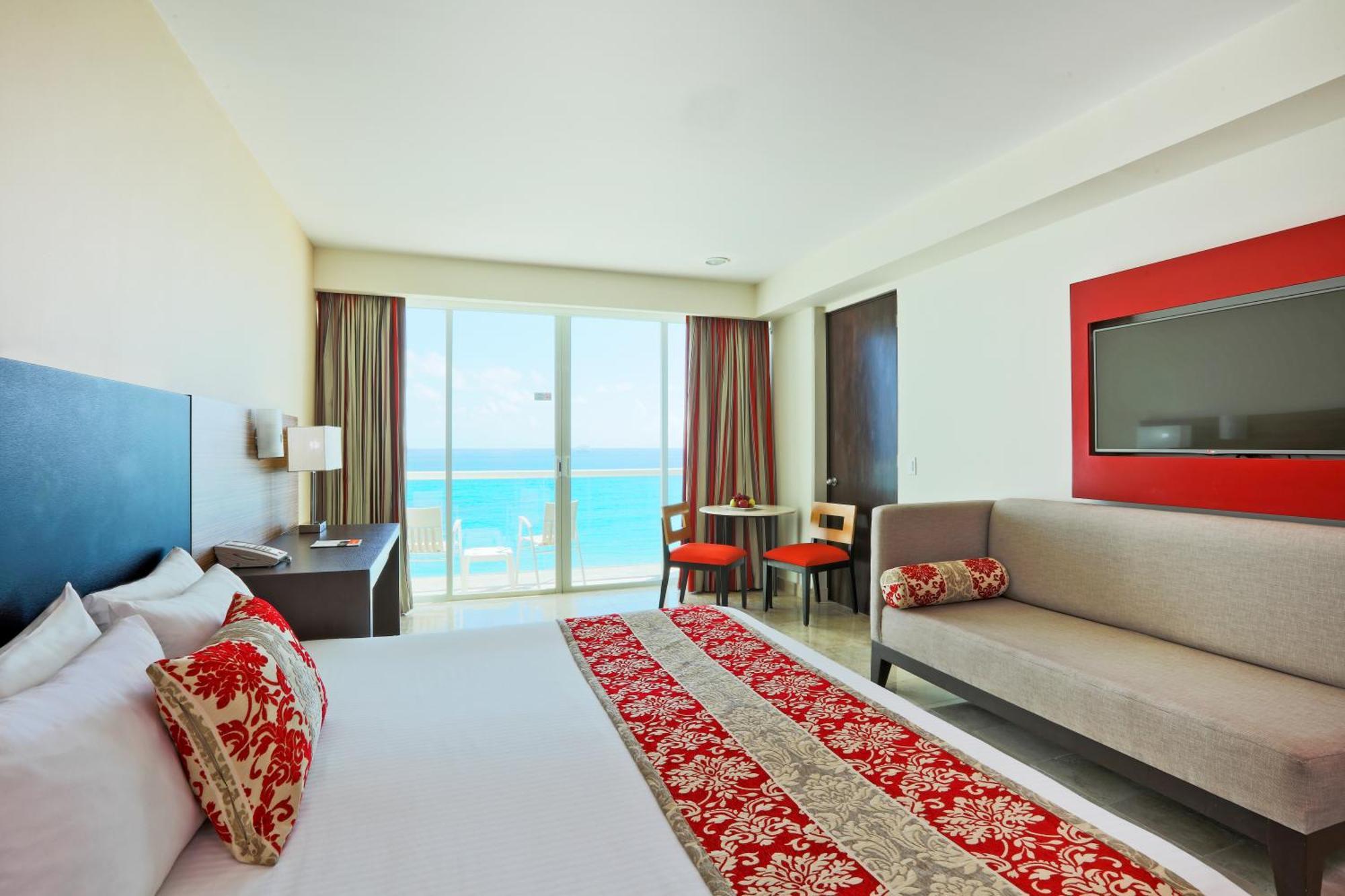 Habitación Club con cama extragrande y vistas al mar